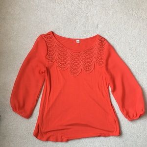 Blood Orange blouse with see through sleeves
